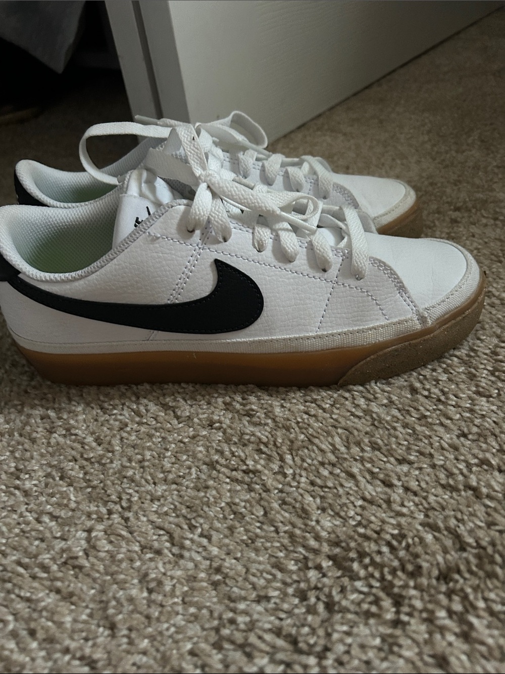 Nike White and Black Low-Top Sneakers with Gum Sole